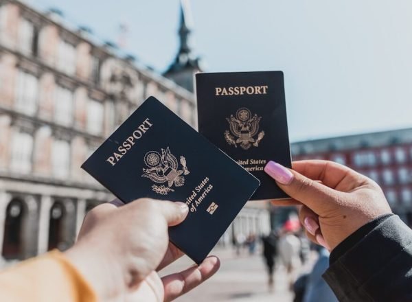 person holding passports